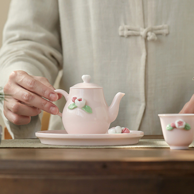 Set di tè in ceramica rosa perfetto per l'ora del tè delle donne nel giorno della dea