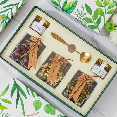 La scatola regalo del tè a fiori preferita dell'agenzia di viaggio della serie di foreste regalo a mano per i festival