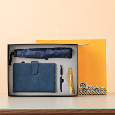 Four Piece Business Gift Set Notebook Pen Bookmark e ombrello con logo personalizzato